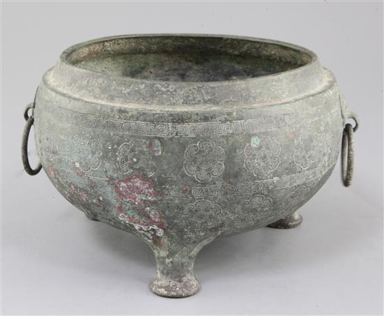 A Chinese archaic bronze tripod vessel base, Dui, Eastern Zhou dynasty, 6th-5th century B.C., 25cm wide, 15cm high, hole, lacking cover